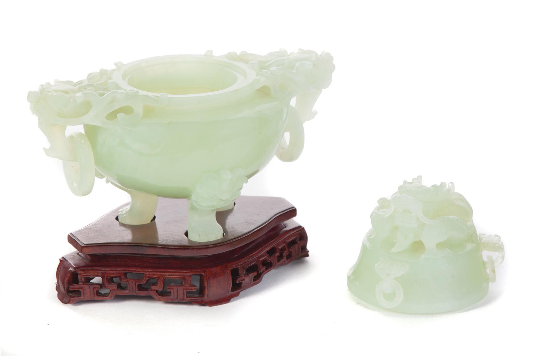 Appraisal: CHINESE CENSER Twentieth century pale green serpentine Dragon finial and