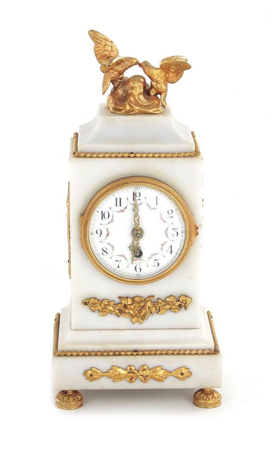 Appraisal: French gilt-bronze mounted marble clock th century lovebird finial on