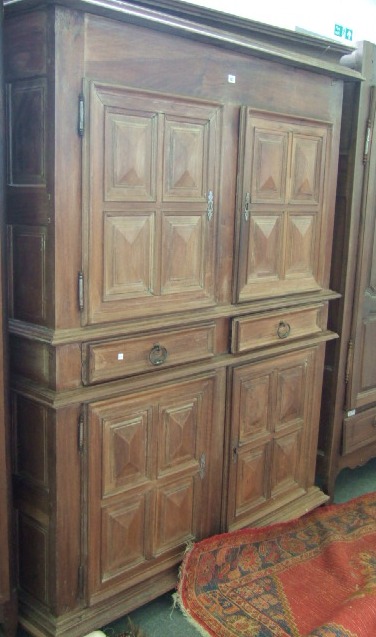 Appraisal: A th century walnut cupboard the moulded cornice over a