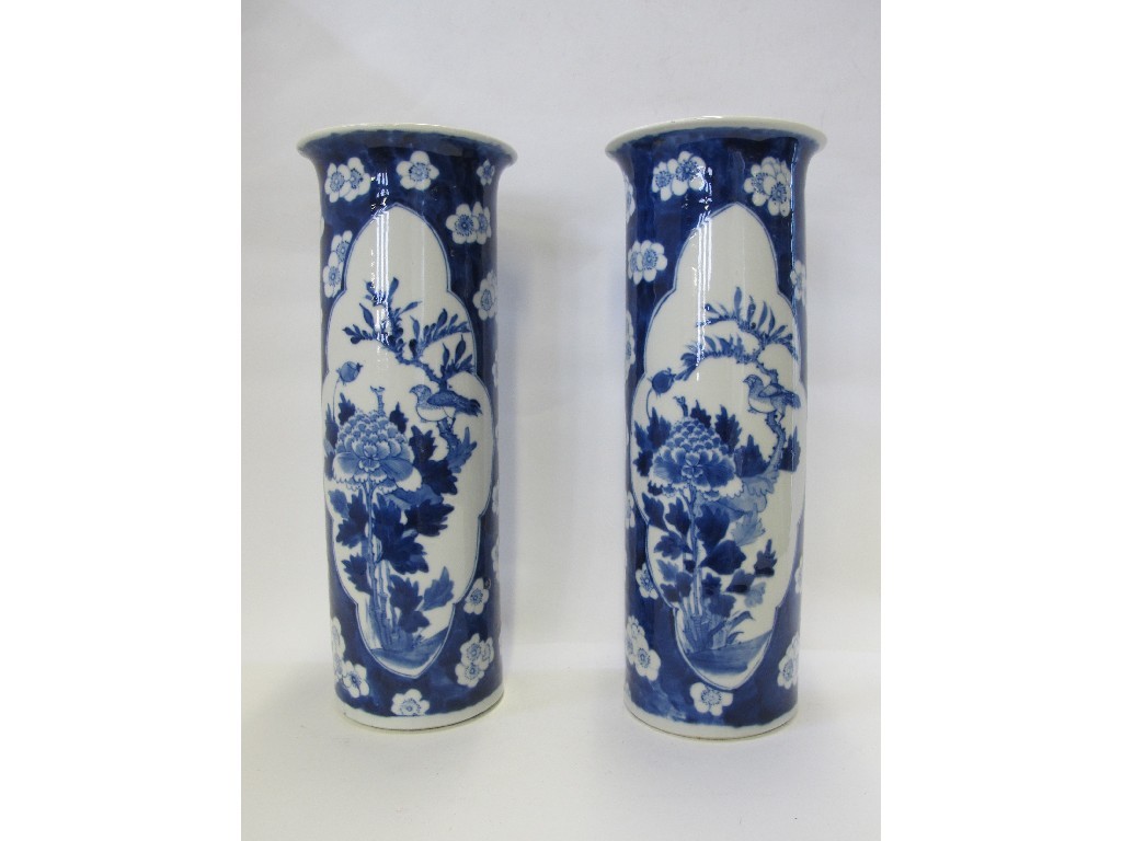 Appraisal: Pair of Chinese blue and white prunus ground vases with