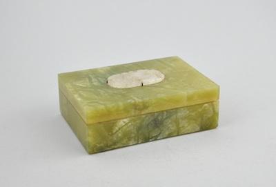 Appraisal: A Carved Hardstone Box with White Jade Medallion Well-carved hardstone