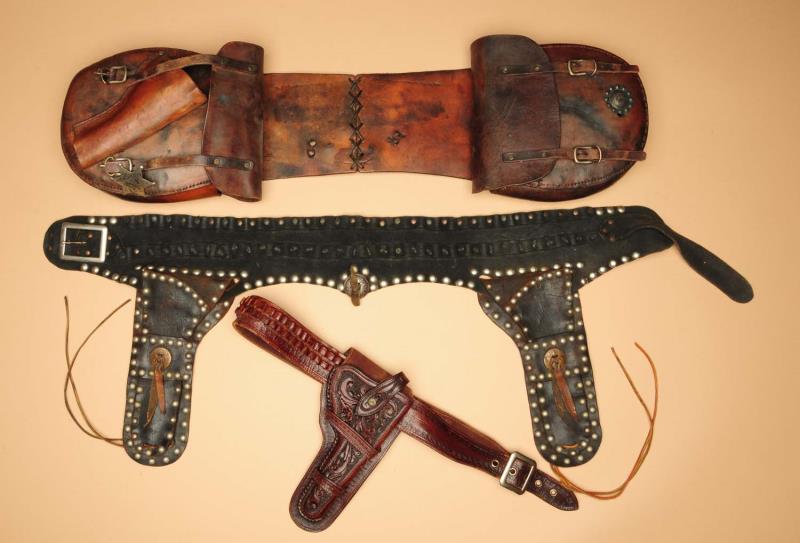 Appraisal: Lot of Pistol Rigs Saddlebag One homemade double pistol rig