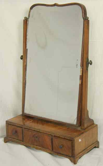 Appraisal: An th Century walnut dressing mirror the ogee arched bevelled