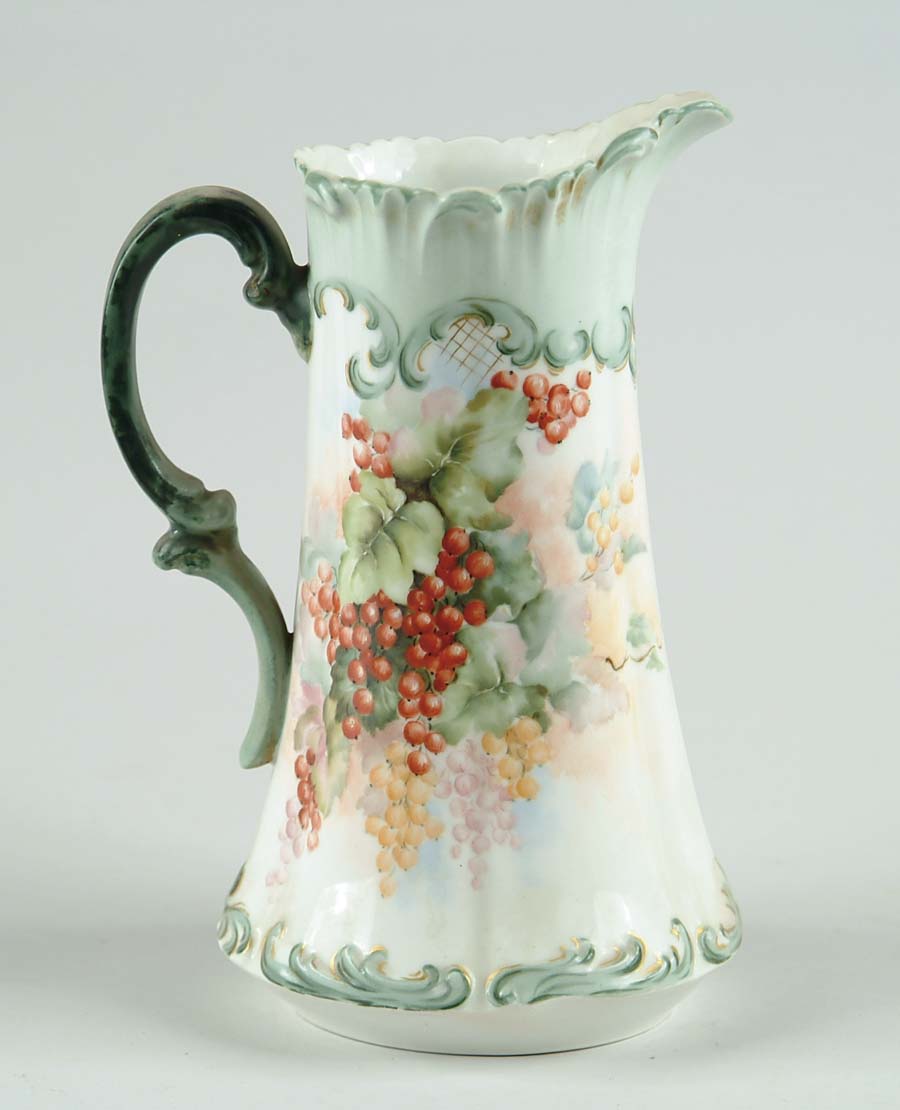 Appraisal: LIMOGES HAND PAINTED LEMONADE PITCHER Pink gold and red berry