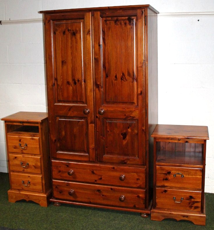 Appraisal: A modern matched pine two pieced bedroom suite comprising wardrobe