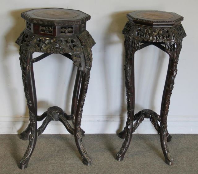 Appraisal: Two Highly Carved Hardwood Octagonal MarbleTop Stands Includes two tables