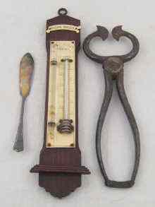 Appraisal: A th c '' weather indicator'' thermometer and storm glass