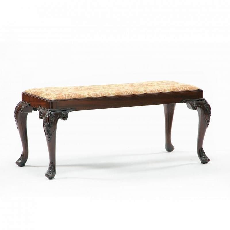 Appraisal: Continental Carved Bench early th century mahogany upholstered slip seat