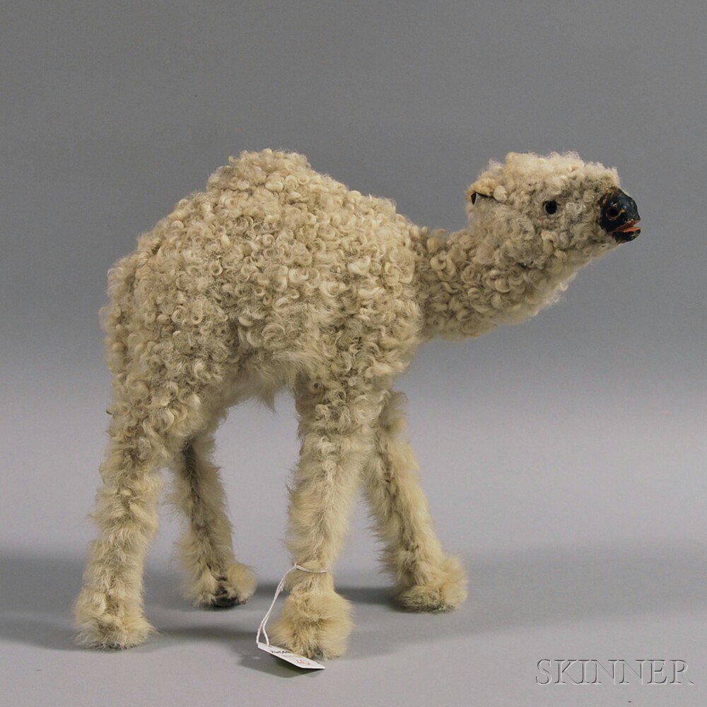 Appraisal: Hide-covered Camel Toy with curly hair to head and body