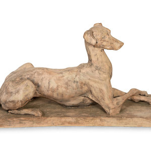 Appraisal: A Terra Cotta Model of a Recumbent Hound th Century