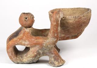 Appraisal: Pre-Columbian figure depicted holding a bowl with a later attached