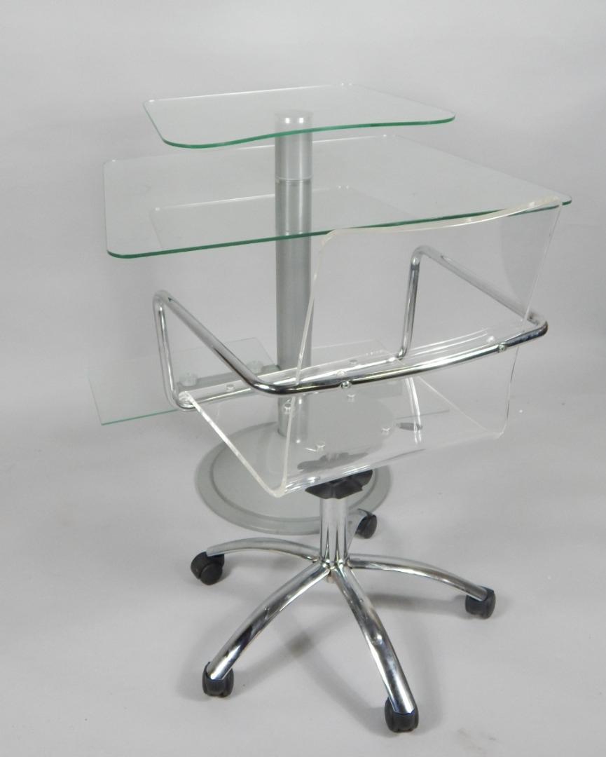 Appraisal: A glass and metal three tier stand cm high and