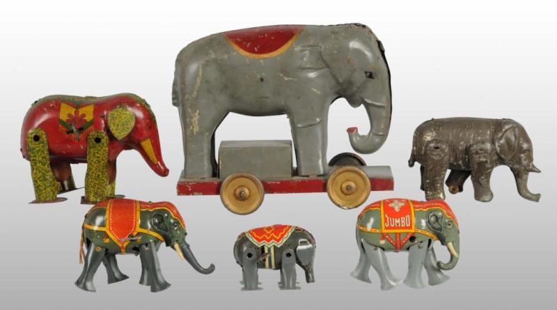 Appraisal: Lot of Tin Elephant Wind-Up Friction Toys Description German and