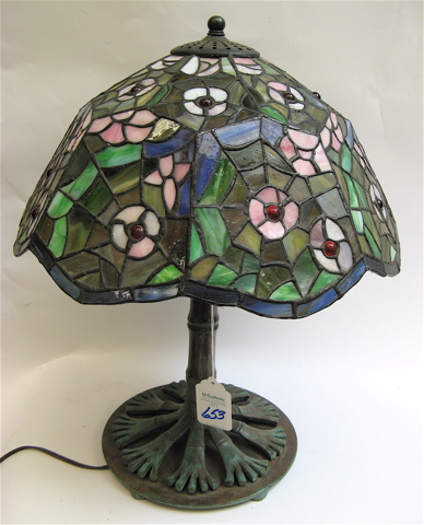 Appraisal: A SPIDER WEB STAINED AND LEADED GLASS TABLE LAMP with