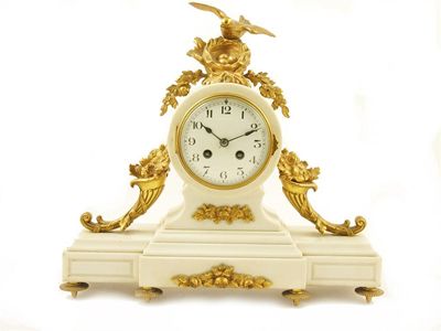 Appraisal: A French white marble and gilt brass mounted mantel clock