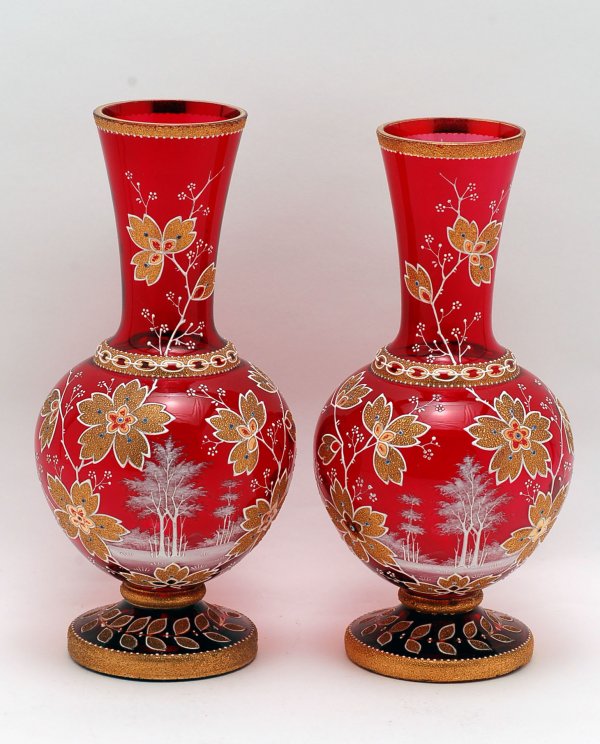 Appraisal: Pair of Victorian cranberry glass vases with white enameled forest