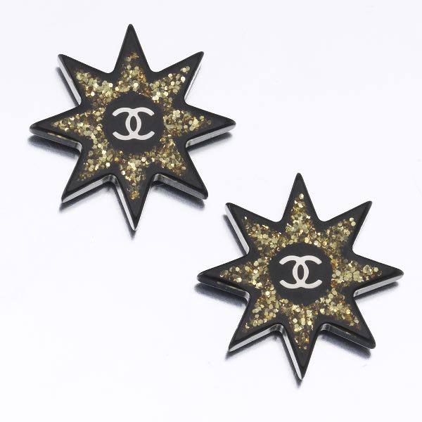 Appraisal: CHANEL CC RESIN AND GLITTER STAR EARRINGS x each Chanel