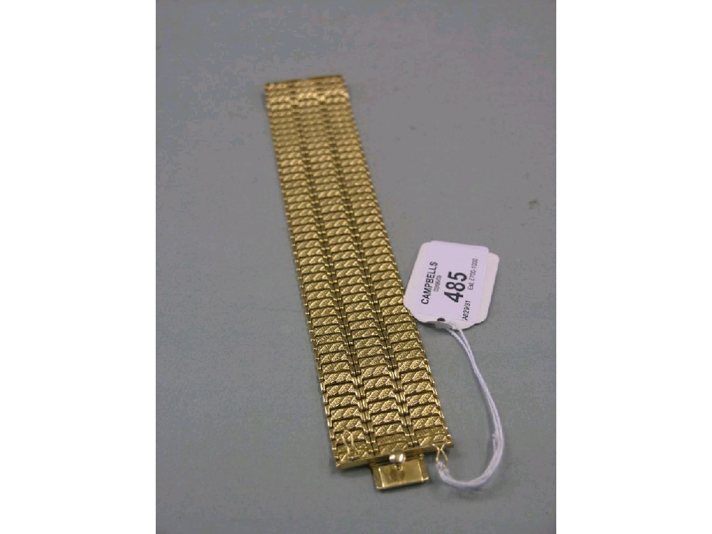 Appraisal: An ct gold three row bracelet mesh link design grams