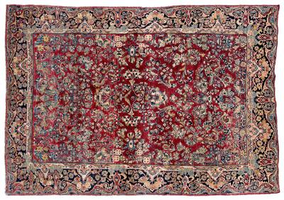 Appraisal: Sarouk rug repeating floral designs on salmon field s ft