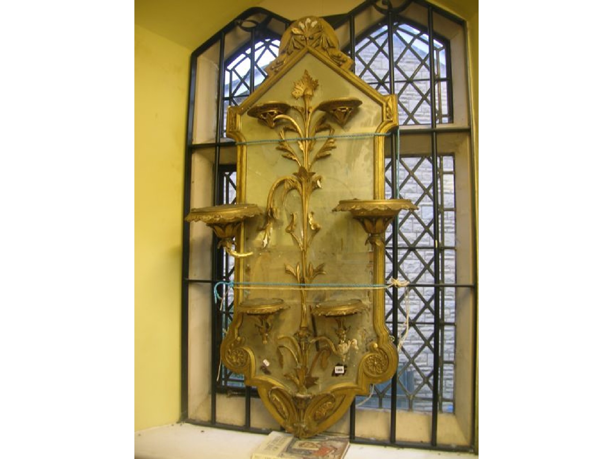 Appraisal: A mid Victorian pier glass the rectangular mirror plate within