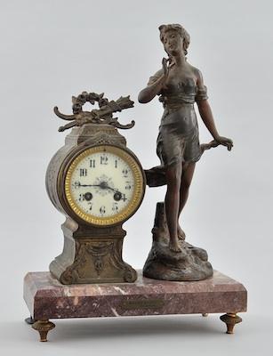 Appraisal: A Spelter Figural Clock on Marble Base The figure of