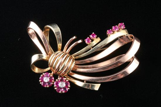 Appraisal: K ROSE AND YELLOW GOLD RUBY AND DIAMOND RETRO BROOCH