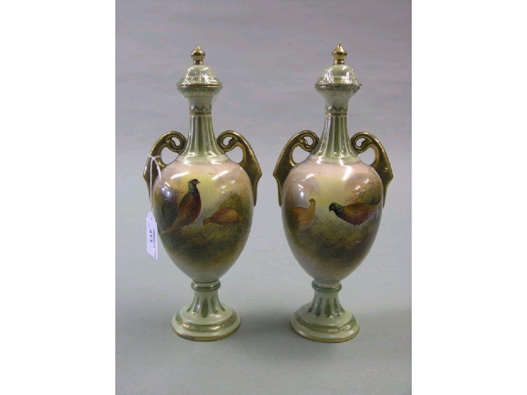 Appraisal: A pair of Fieldings Crown Devon vases each two handled