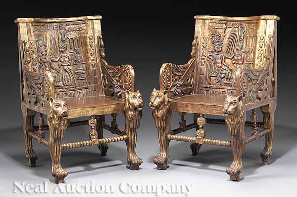 Appraisal: A Pair of Egyptian Revival Carved and Polychromed Armchairs the