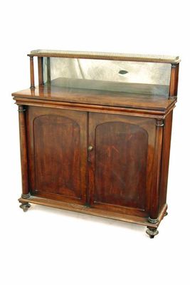 Appraisal: An early Victorian mahogany chiffonier the raised mirrored back with