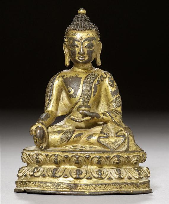 Appraisal: A SMALL GILT COPPER ALLOY FIGURE OF THE MEDICINE BUDDHA