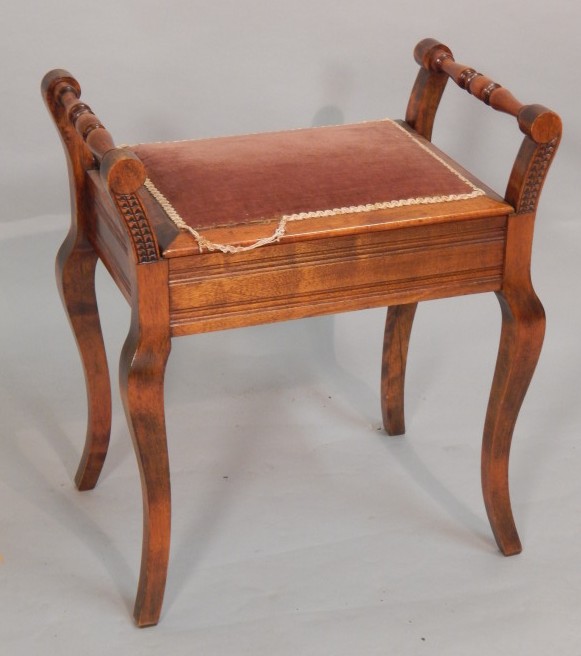 Appraisal: An early thC stained beech piano stool with turned arm