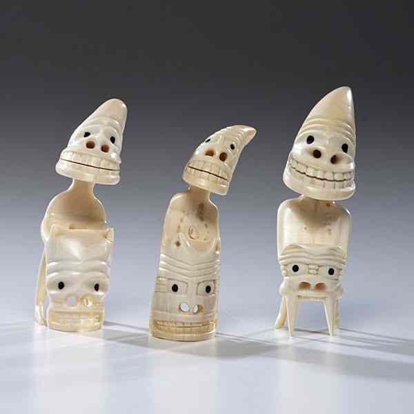 Appraisal: Greenland Eskimo Walrus Ivory Tupilaks lot of smiling beings each