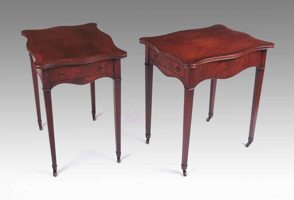 Appraisal: PAIR BEACON HILLS MAHOGANY LAMP TABLES Shaped mahogany top with