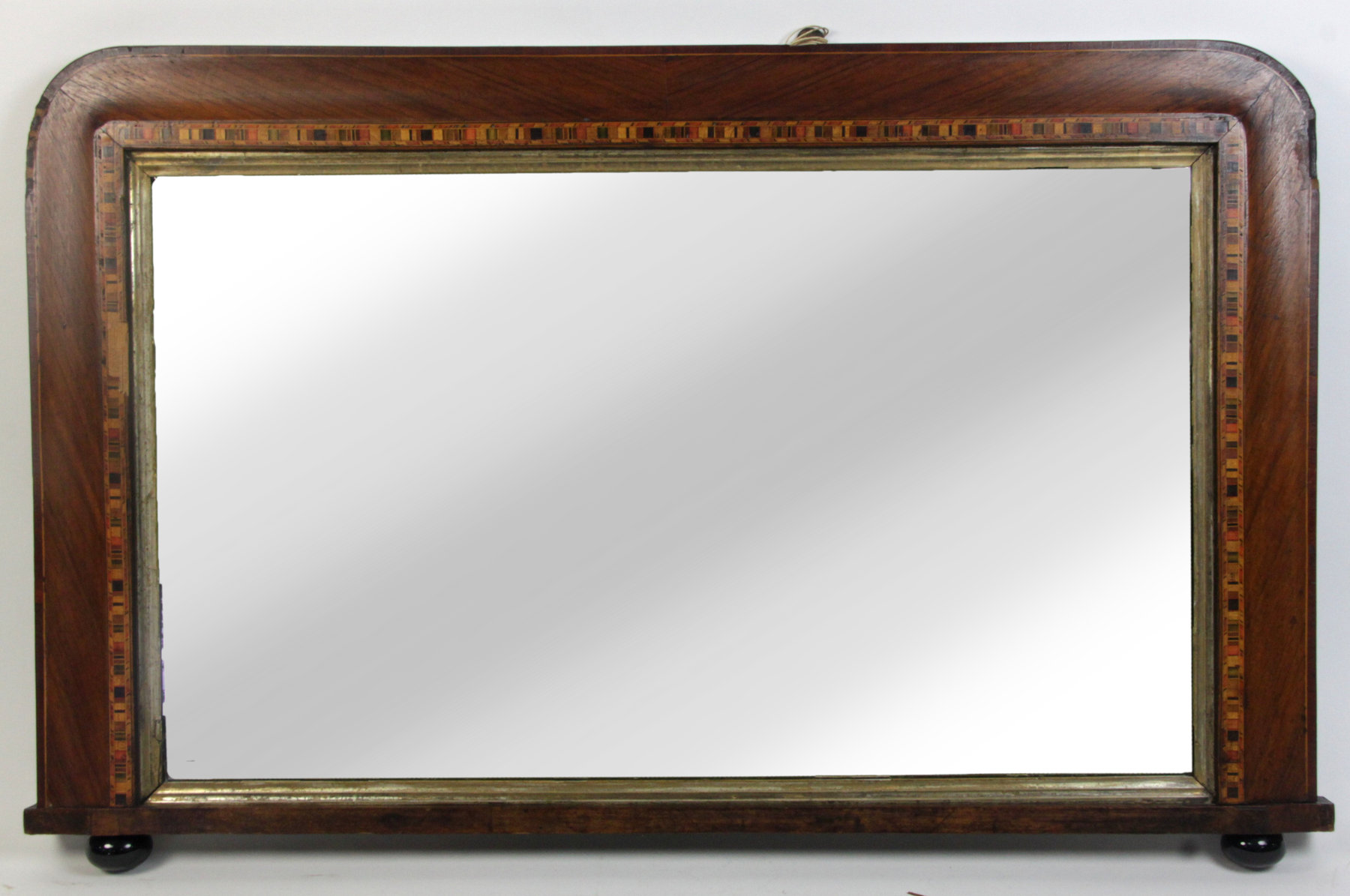 Appraisal: A Victorian wall mirror with Tunbridge border and porcelain ball