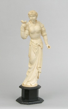 Appraisal: A Carved Ivory Figural of a Lady Holding a Bird