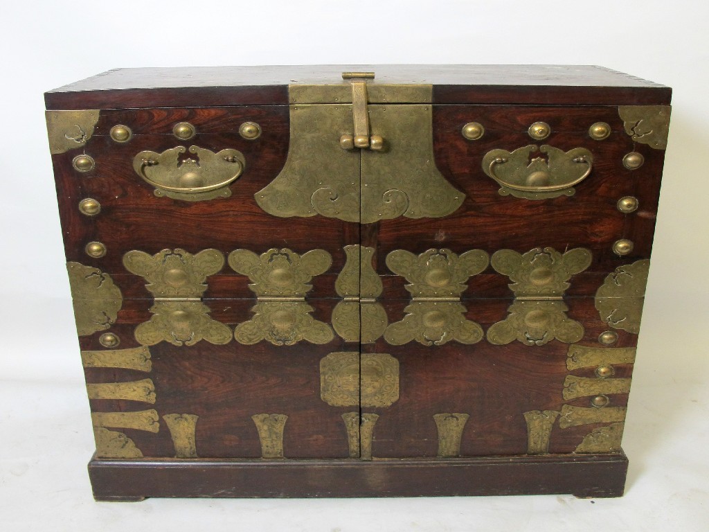 Appraisal: A th Century Chinese rosewood collectors chest with ornate brass