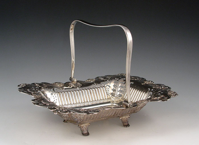 Appraisal: ENGLISH FOOTED RETICULATED SILVERPLATE BASKET Early th century Johnson Durban