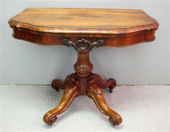 Appraisal: th century rosewood serpentine folding tea table on column support