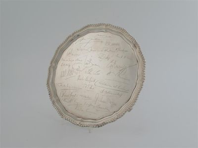 Appraisal: A modern salver of shaped circular outline with a gadrooned