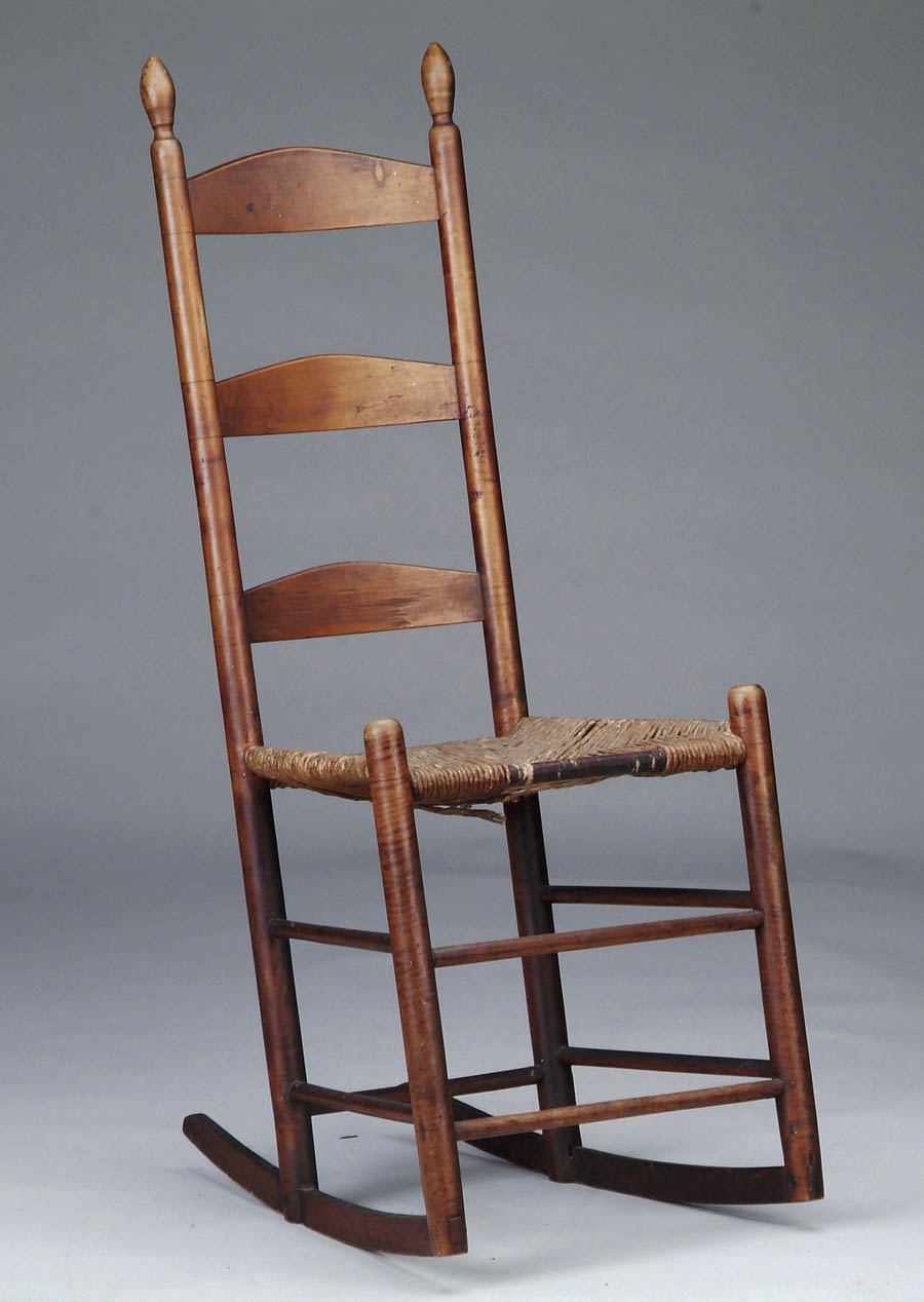 Appraisal: ANTIQUE LADDER-BACK SHAKER ROCKING CHAIR Front posts in curly maple