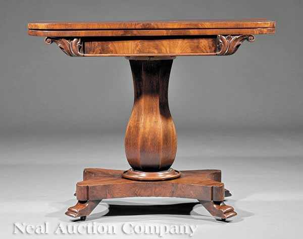 Appraisal: A William IV Carved Mahogany Games Table c foldover swivel