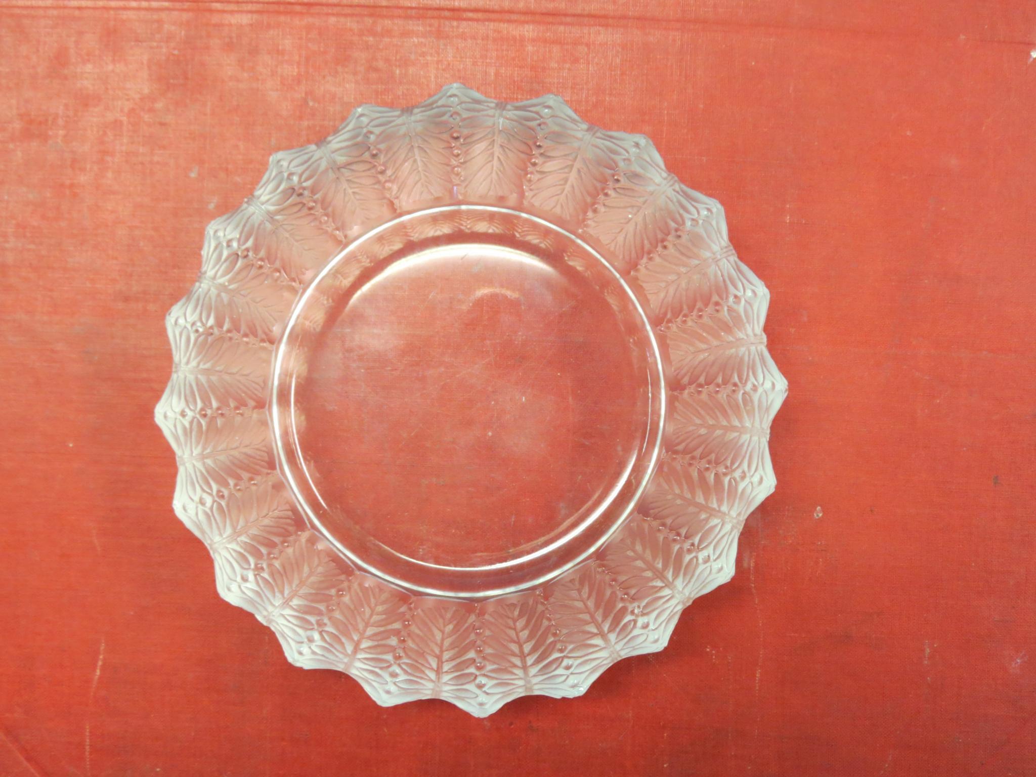 Appraisal: A Lalique glass ash-tray post-war circular shape with moulded leaf