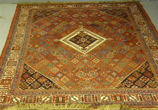 Appraisal: Persian red ground carpet with multiple borders with a central