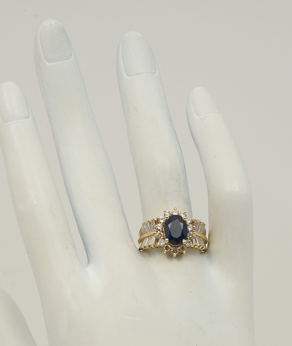 Appraisal: K CTW SAPPHIRE DIAMOND RING K yellow gold ring contains