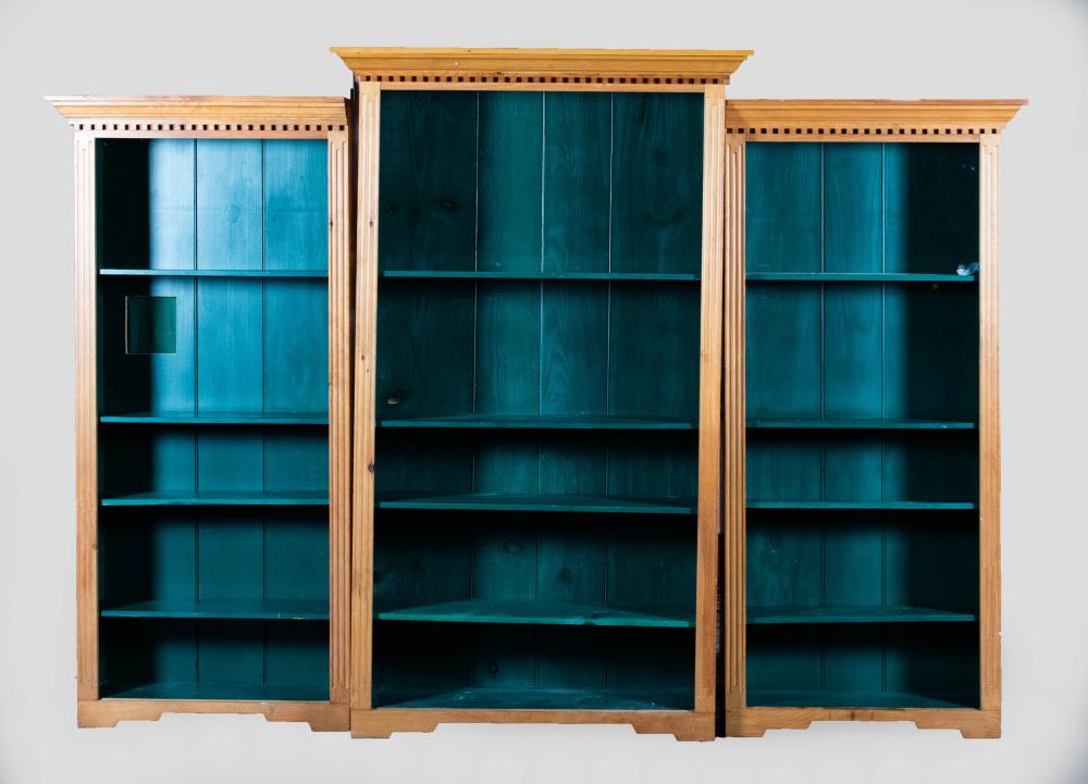 Appraisal: GEORGE III STYLE THREE-PART PINE BREAKFRONT BOOKCASE with dentil molded