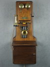 Appraisal: WALL PHONE - EARLY TH C LARGE SOLID WALNUT CASED