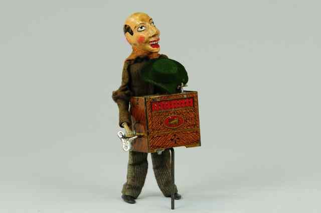 Appraisal: MARTIN ORGAN GRINDER France hand painted composition head lithographed tin