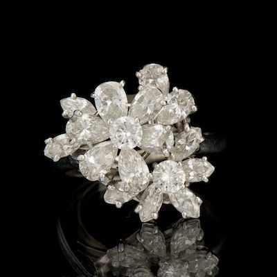 Appraisal: A Ladies' Platinum and Diamond Flower Motif Ring Platinum ring