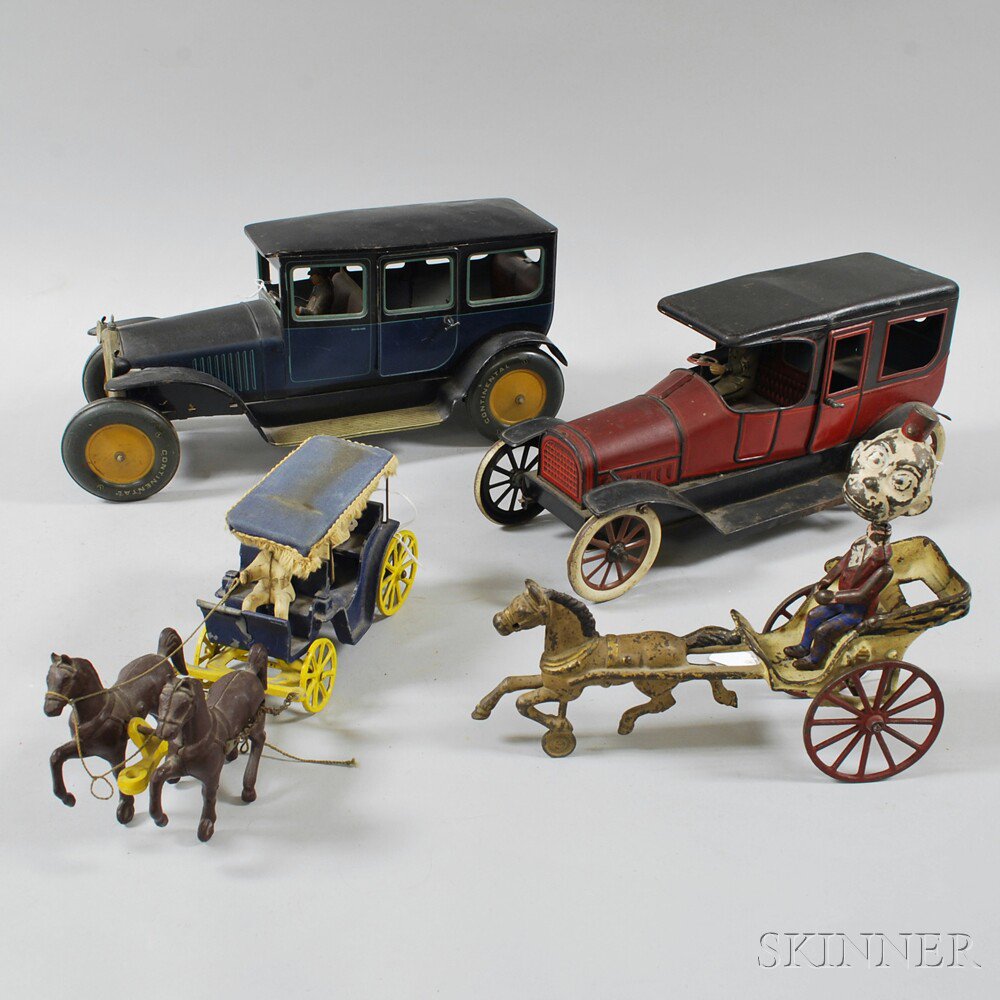 Appraisal: Four Toy Metal Vehicles two lithographed tin clockwork cars a