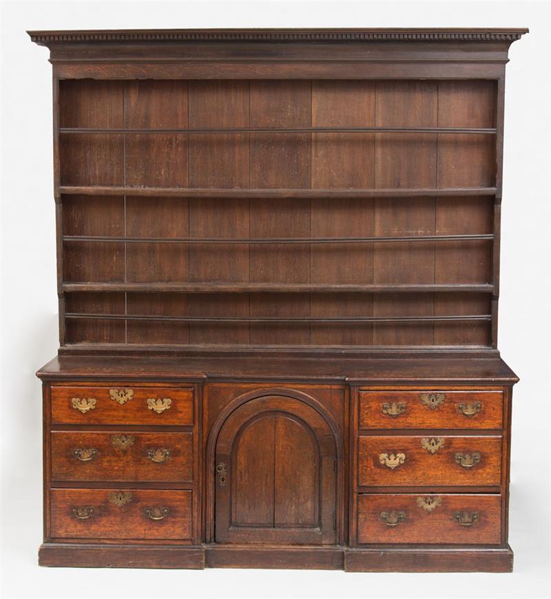 Appraisal: WELSH OAK DRESSER The overhanging dentil molded cornice above three